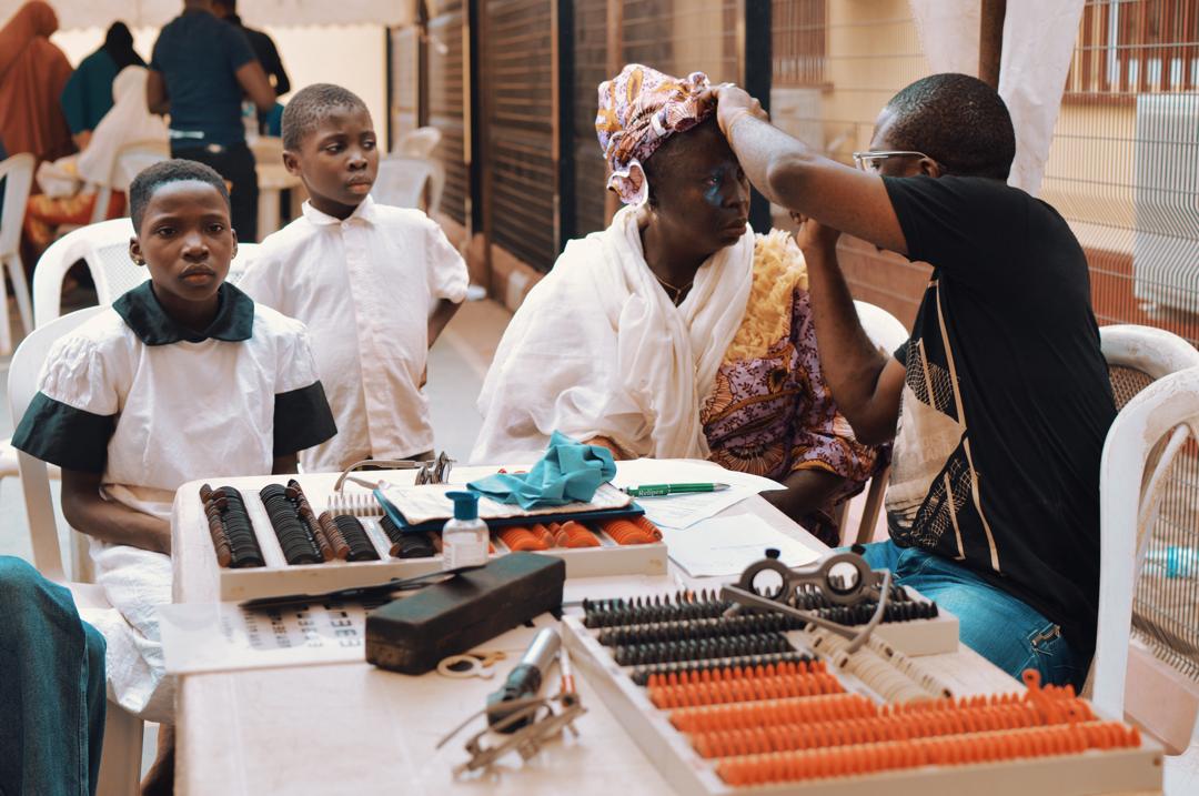 Dele Fayemi supporting a community eye-care outreach